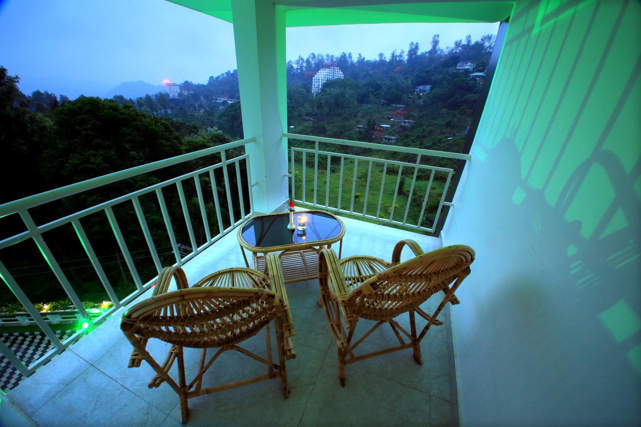 Monsoon Grande Hotel Munnar Exterior foto