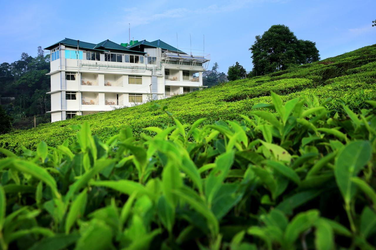 Monsoon Grande Hotel Munnar Exterior foto