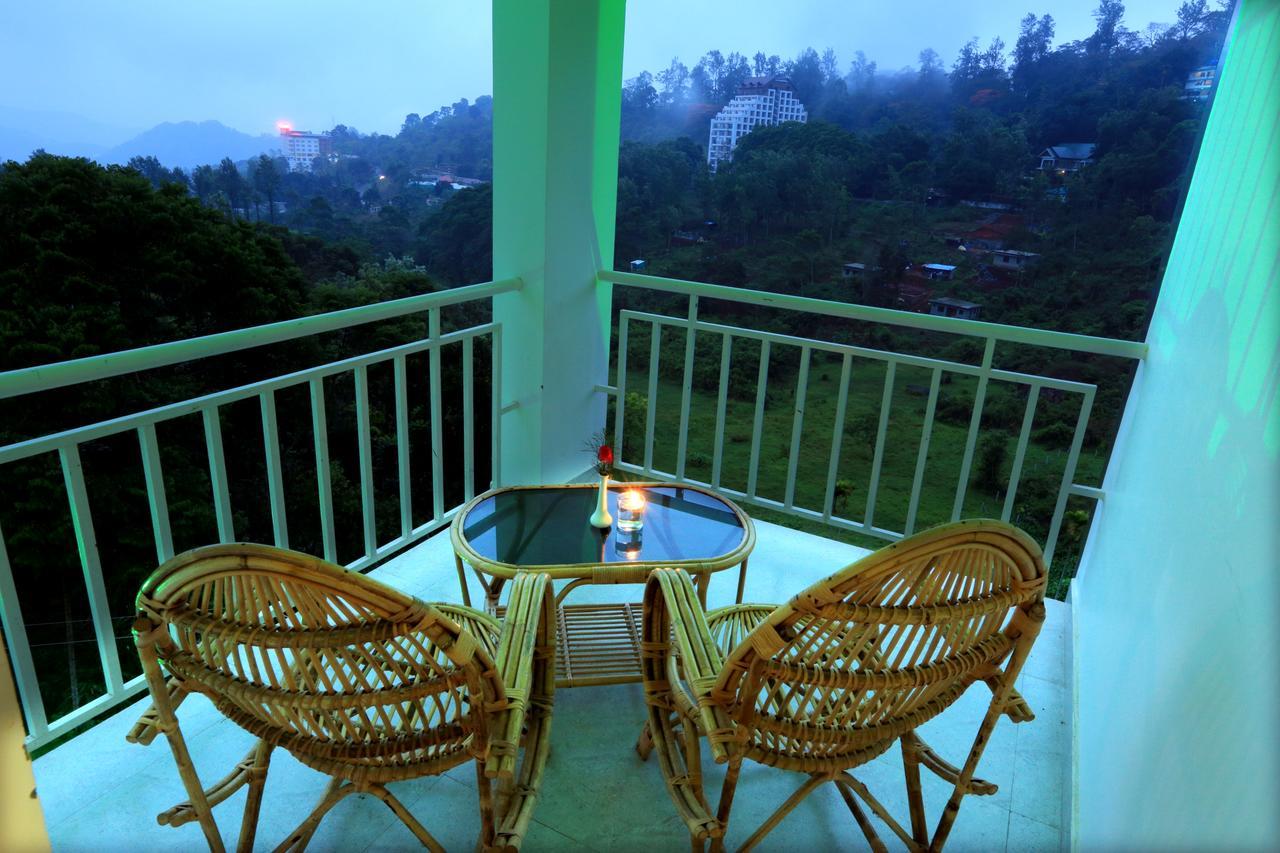 Monsoon Grande Hotel Munnar Exterior foto