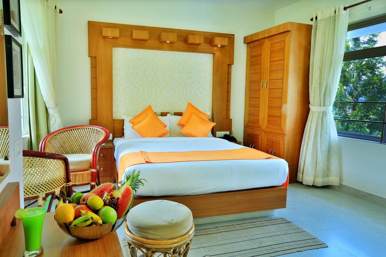 Monsoon Grande Hotel Munnar Exterior foto