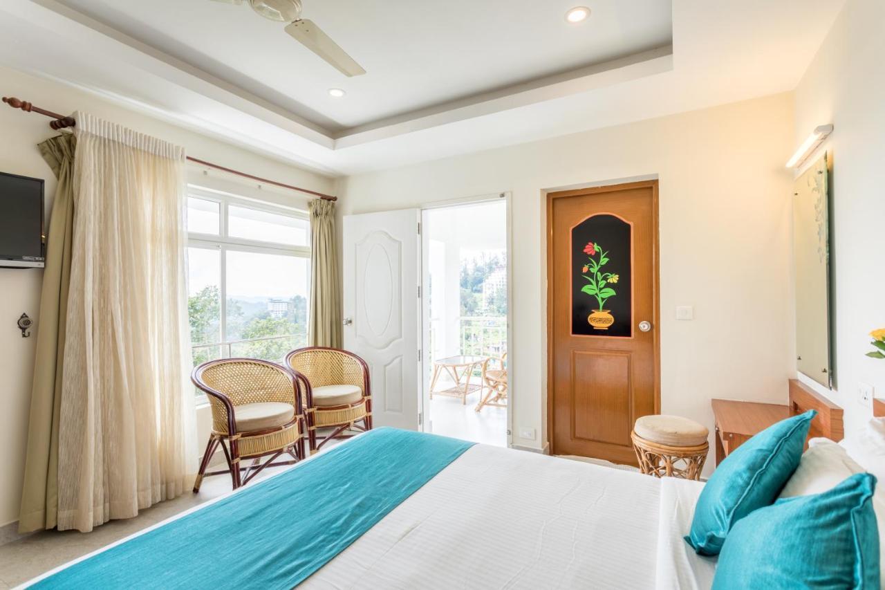 Monsoon Grande Hotel Munnar Exterior foto